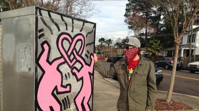 KHG and one of his paintings. Image via First Coast News