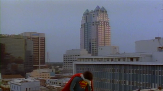 Lonely Bizarro (Barry Meyers) weeps in the shadow of the SunTrust Center.