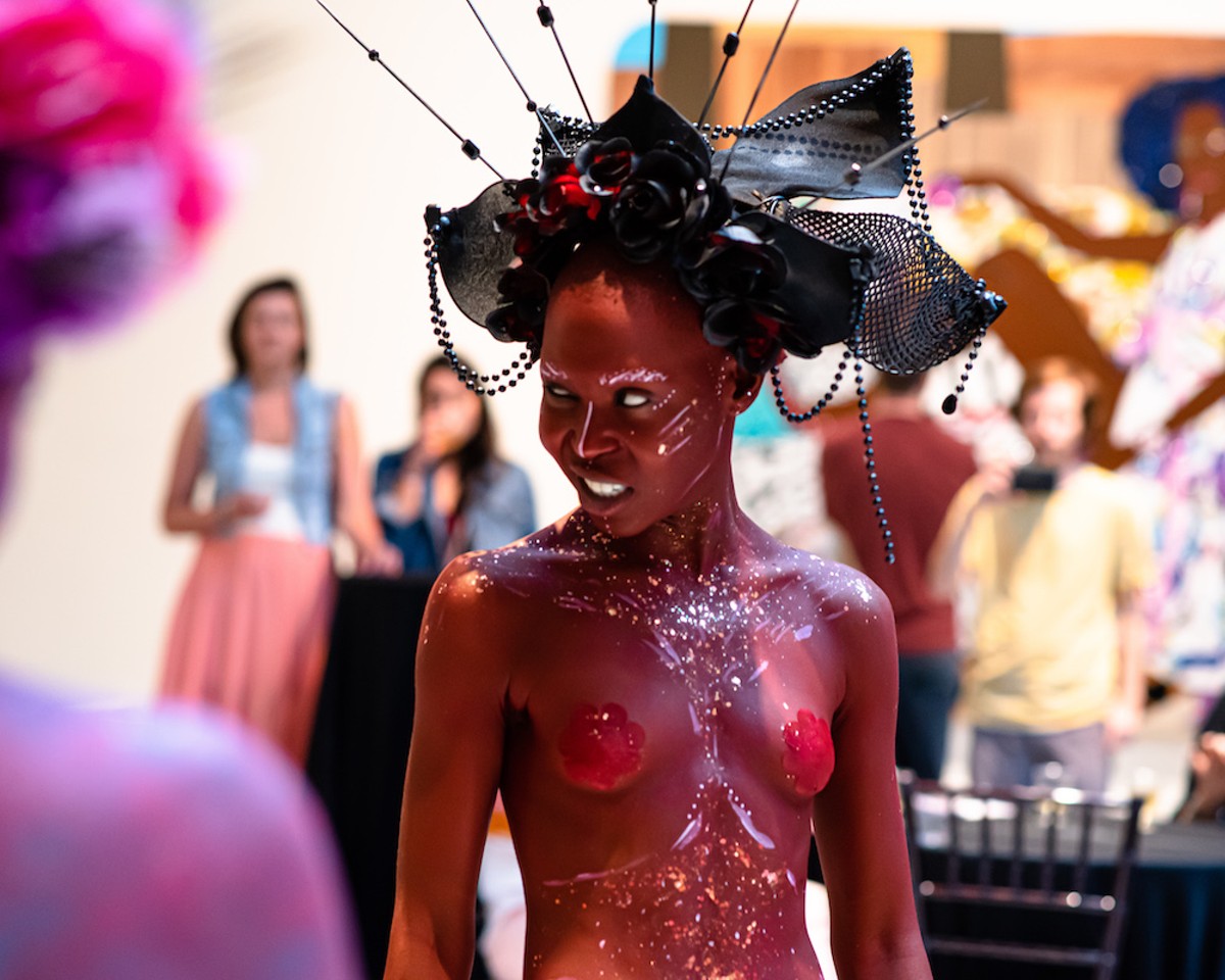 Artist Adri embodies one of the seven Orishas, Oya, through ornate headwear and body paint. She and her group, the Rainbow Myriads, offered live performance at Indigenous Futurism.
