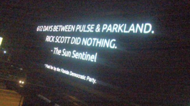 Florida Democrats knock Rick Scott on gun record via Orlando billboard