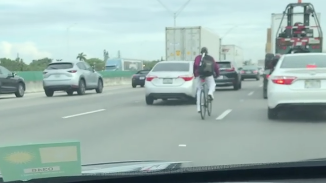 Here's a guy riding his bike on I-95 in Florida