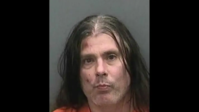 Cannibal Corpse guitarist arrested for 'running toward an officer with a knife' as his Florida home burns down