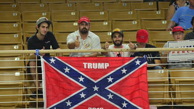 A 'Trump 2016' Confederate flag made its debut and exit at Thursday's Kissimmee rally
