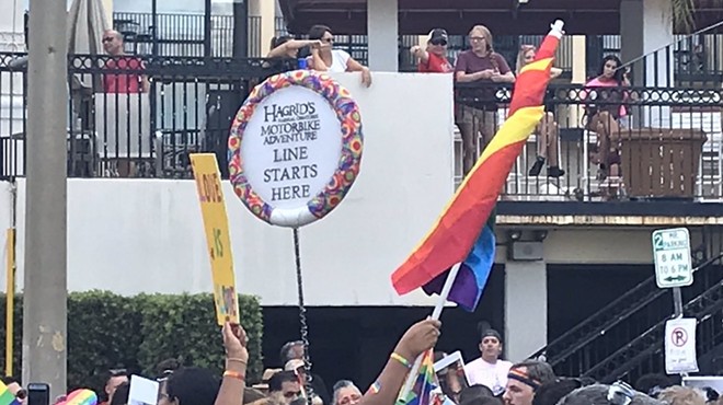 Orlando Pride parade marcher wins the day with wicked Hagrid's Motorbike Adventure sign