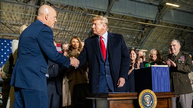 Donald J. Trump greets Gen. Jay Raymond after being named the first Chief of Space Operations and first member of the United States Space Force
