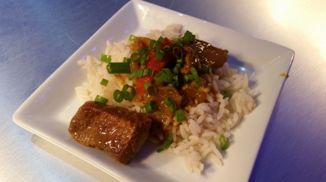 Red hot spicy Thai curry beef with steamed rice (Thailand)