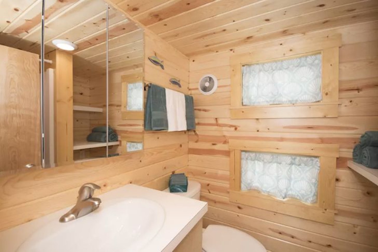 Tiny House Dragonfly near Siesta Key Beach  
4 guests, 1 bedroom, 2 beds, 1 bath
$130 per night
The wood finish continues in their cute bathroom.