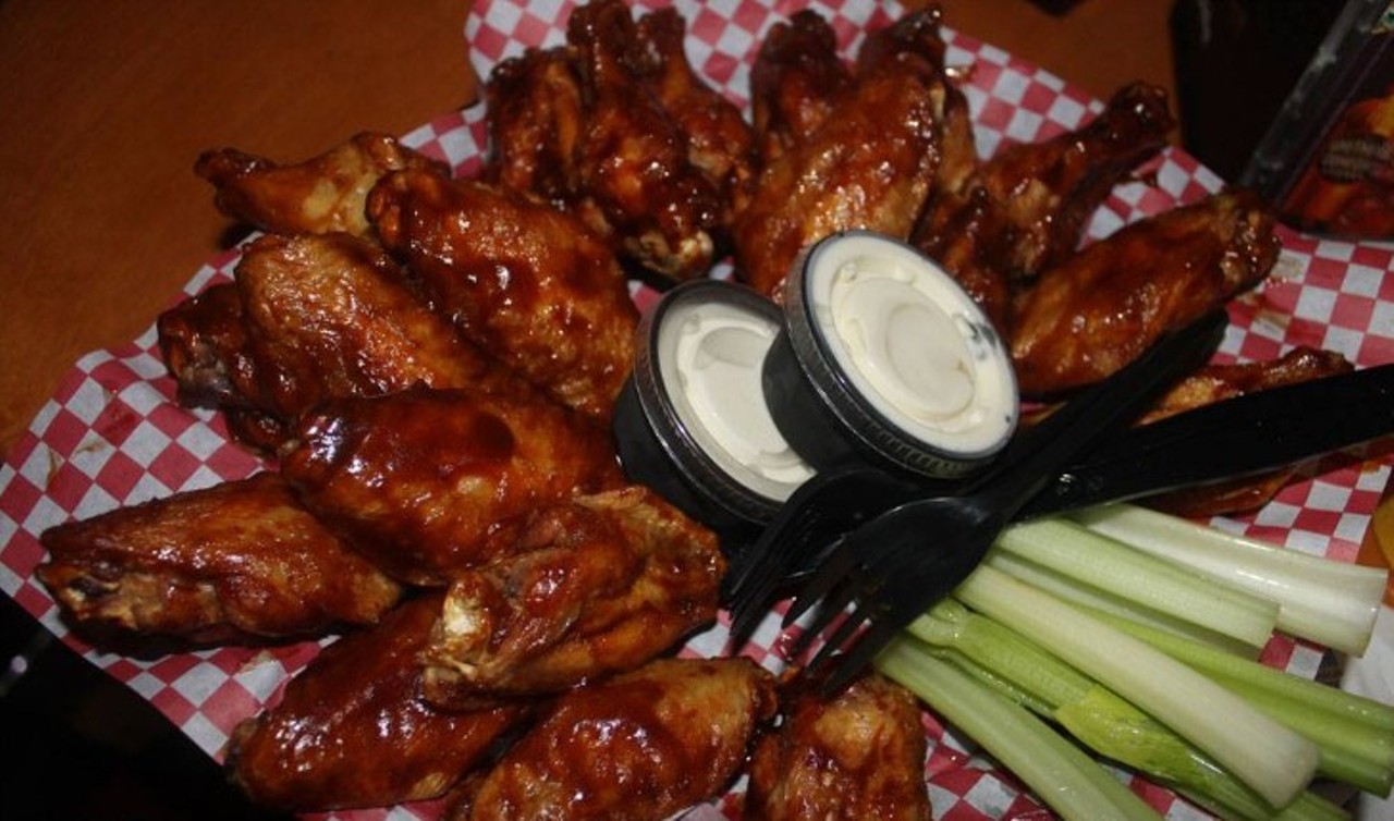Sandbar Sports and Grill
Wings, Wings and Wings
The dish one must slay before departing back to their humble bungalows is wings. Simple to hear but unfathomably to describe taste-wise. Pizza and margaritas are a must too but the chicken on bone here is simply divine and definitely worth your time. 
Photo via Sandbar Sports bar and Grill/Facebook