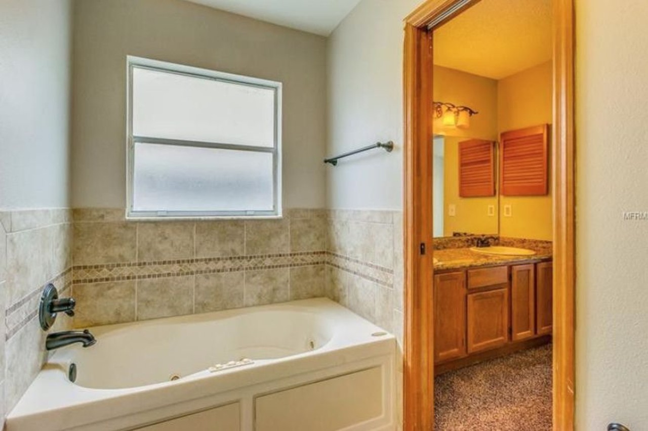 8046 Excalibur Ct
4 beds, 2 baths 1, 1 half bath, 2,039 sq ft,  $283,000
Who doesn't want a bathtub with jets in it?