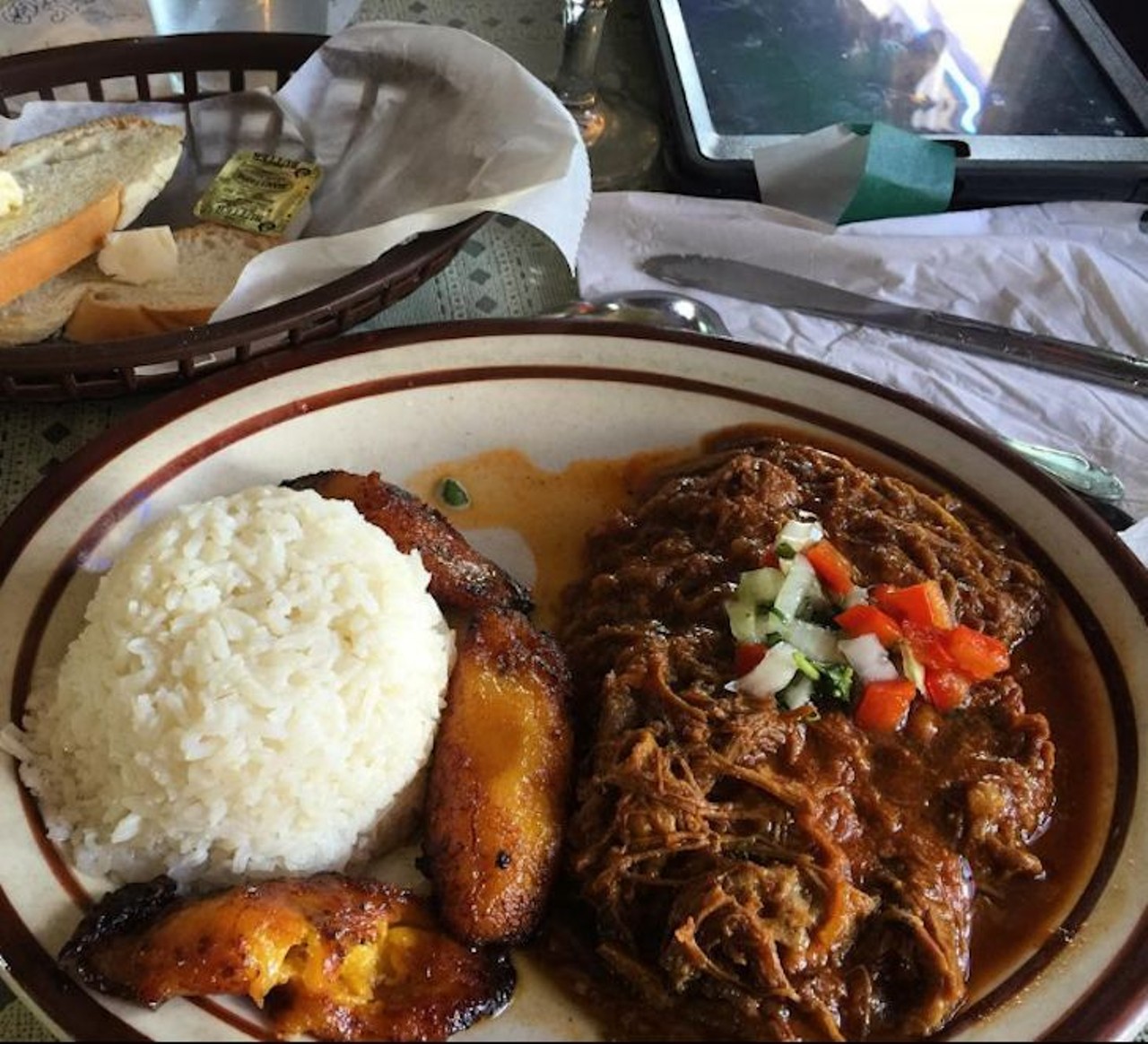 What we recommend: ropa vieja with rice and sweet plantains
One of the national dishes of Cuba, ropa vieja is made of shredded beef in a chili, tomato, onion and cumin sauce. The juices from the sauce elevate the already savory beef, and the sweet plantains offset the salty tang.
Photo via msadrianaperez/Instagram