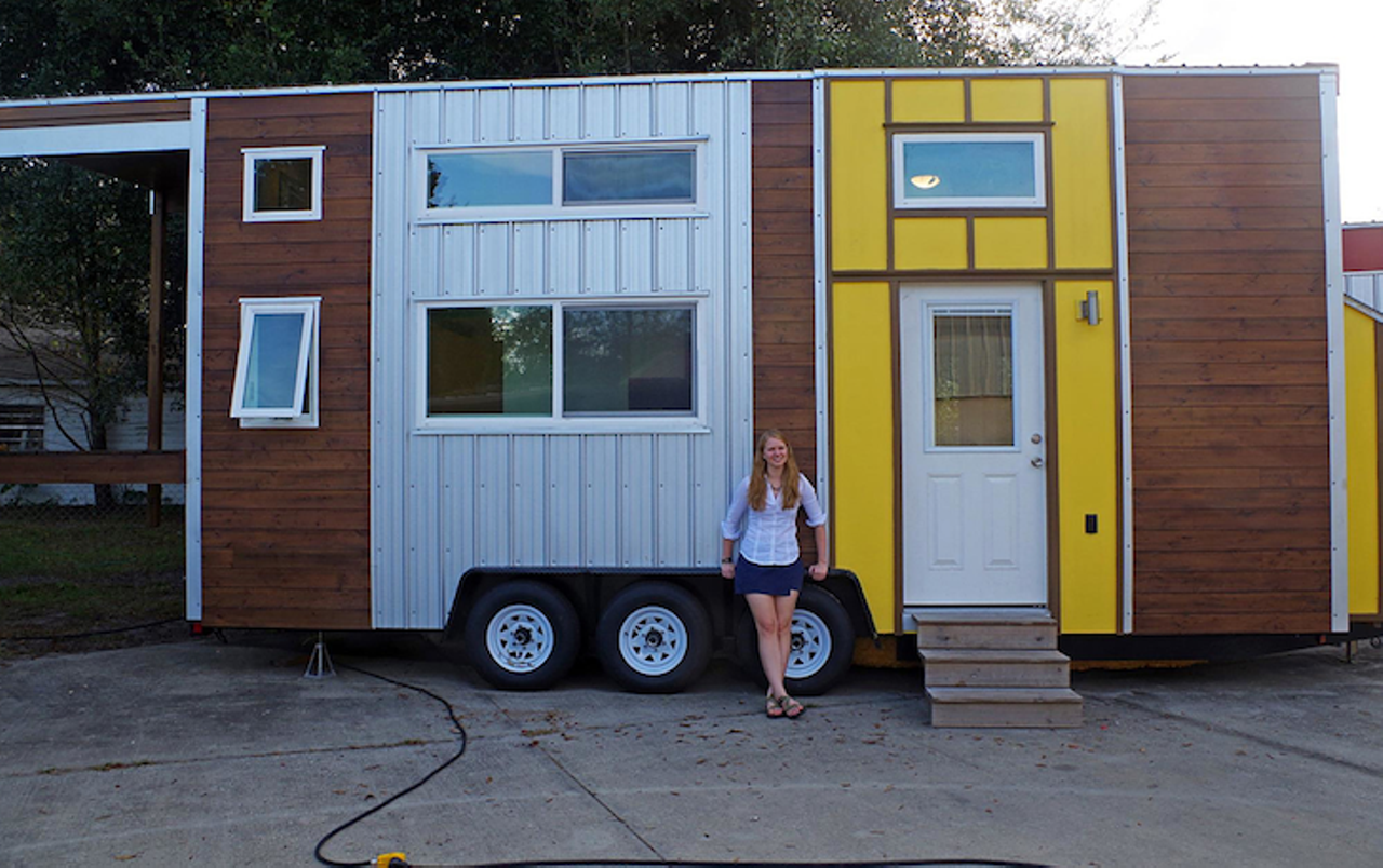 Little Sunshine
Location: Leesburg
Price: $59,000
Size: 225 sq. ft.
This large modern home can roll anywhere you take it and has gorgeous wood designs both in and out. It comes with a laundry area and even a dope balcony area.