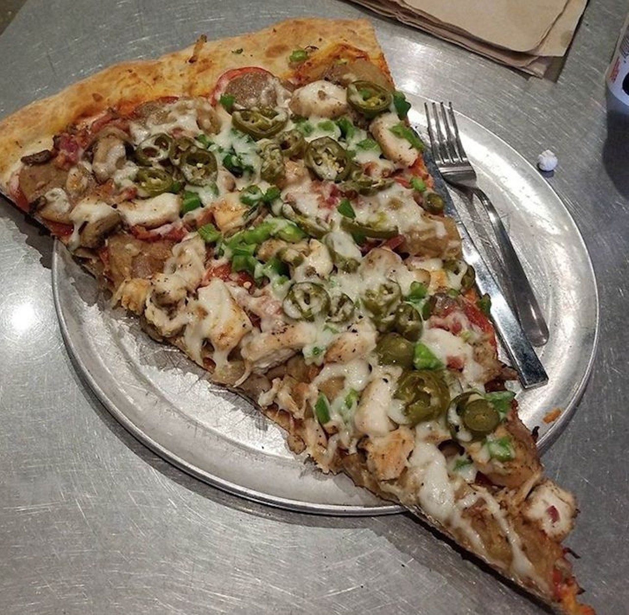 A giant slice of pizza from Lazy Moon 
multiple locations
"Bigger is always better" definitely seems to be the motto at Lazy Moon. Pile on the toppings from their choice of cheeses, fruits, veggies and proteins and you&#146;ve got yourself a nice slice.
Photo via bdeliz/Instagram