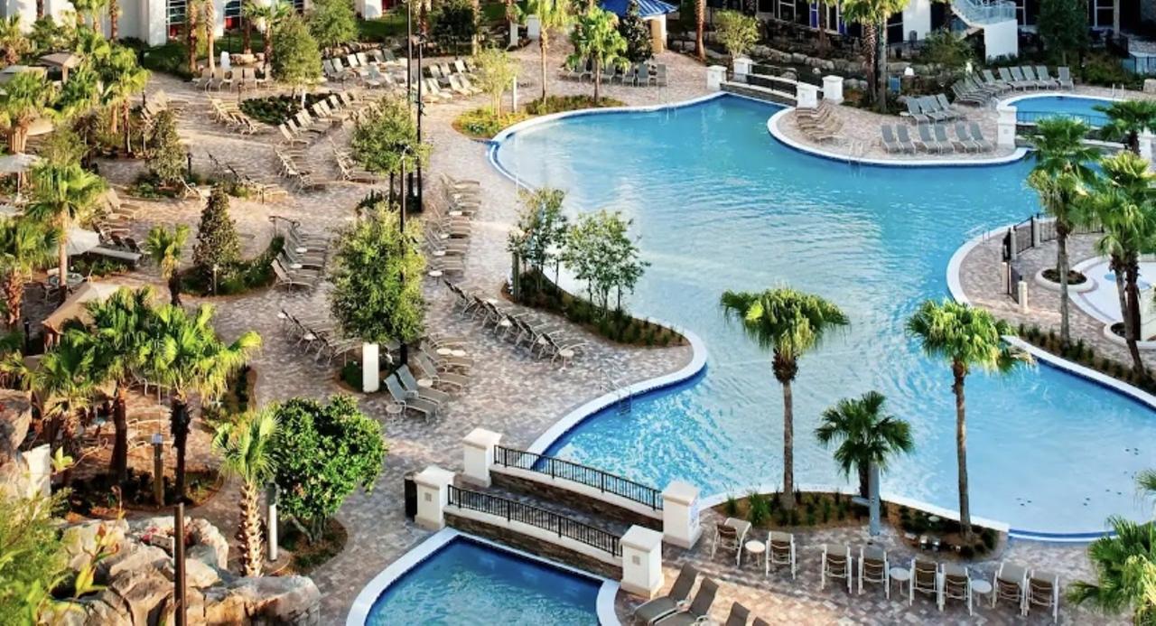 Hyatt Regency Orlando
9801 International Dr, Orlando, 407-284-1234
$10-$275
With its location right by the airport, it is perfect for when you drop off your relatives and you need to relax from their vacation in your home. Hyatt Regency’s day pass includes access to 4 pools and they provide towels. After taking a swim in the many pools you also can play a game of tennis on their rooftop court. For a $275 upgrade you can have a private cabana right next to their bar with a TV and fridge. (They also give you $25 credit to the bar.)