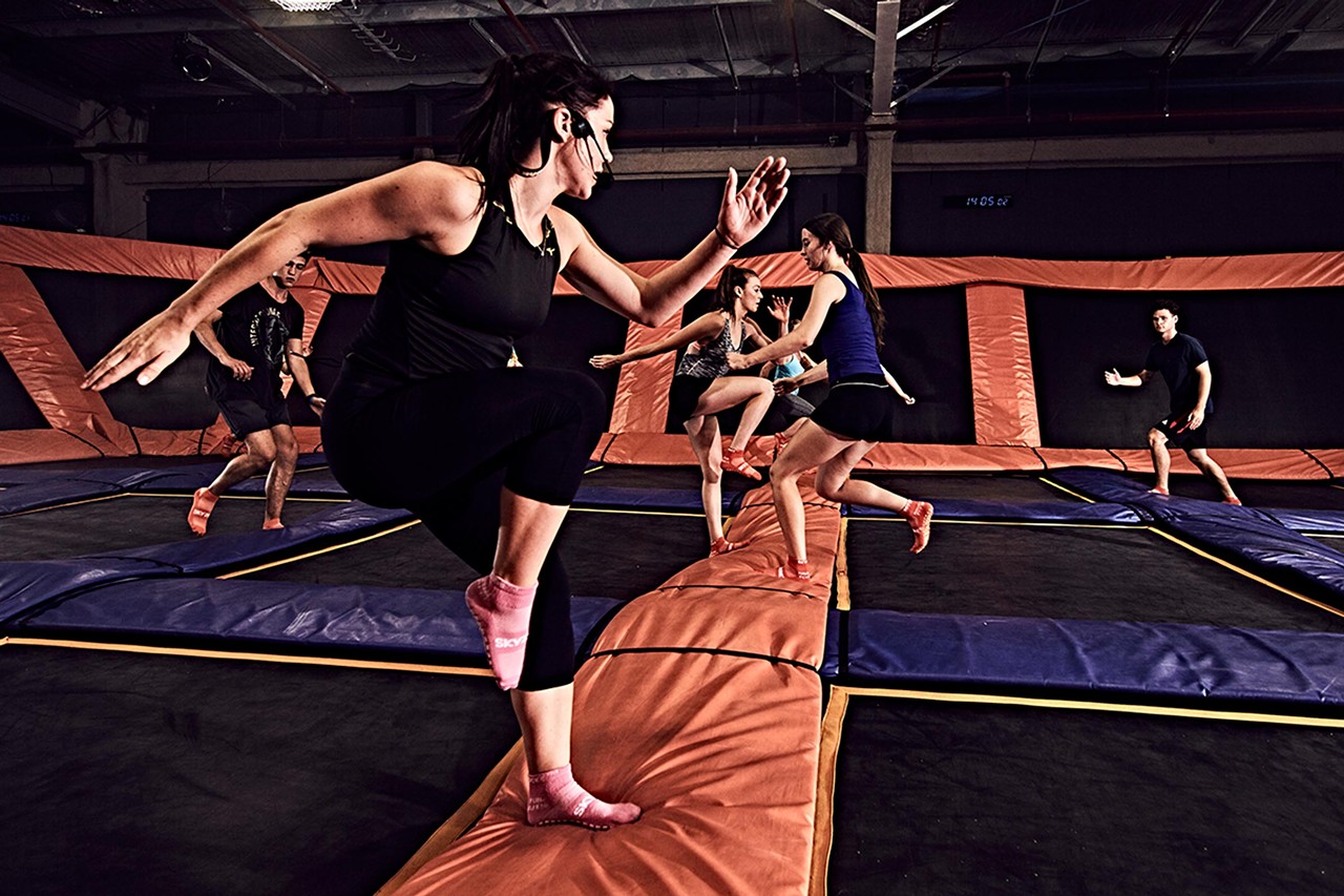  Try SkyFit
5250 International Drive, Orlando, 407-326-0482
Maybe you&#146;ve never considered working out in a glorified adult bounce house, but you definitely should. Sky Zone&#146;s Sky Fit program can help you burn up to 1,000 calories with a mixture of core exercises, aerobics and calisthenics all while jumping and flipping on their wall-to-wall trampolines. This class is also pretty cheap at $7 with their special required socks and $5 if you already have a pair. 
Photo via Sky Zone
