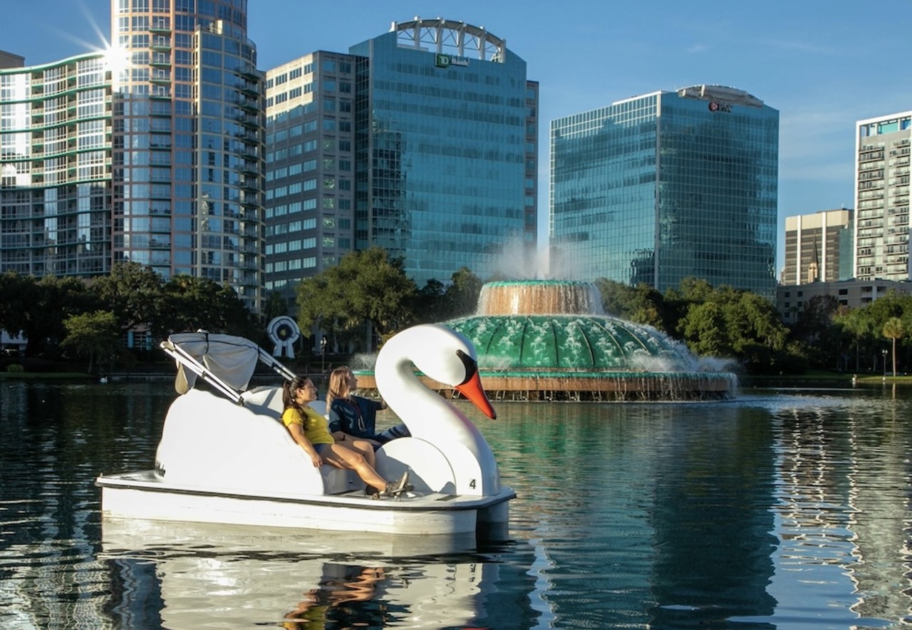Ride a swan, picnic at or walk through Lake Eola Park
512 E. Washington St., Orlando
Right in the heart of Orlando is Lake Eola Park, a glistening body of water surrounded by ample space for picnicking, sightseeing and taking a breather just outside of the bustle of downtown. It's an essential spot for Orlandoans to know — and you get locals-only bonus points for actually riding in the tourist-adored swan boats.