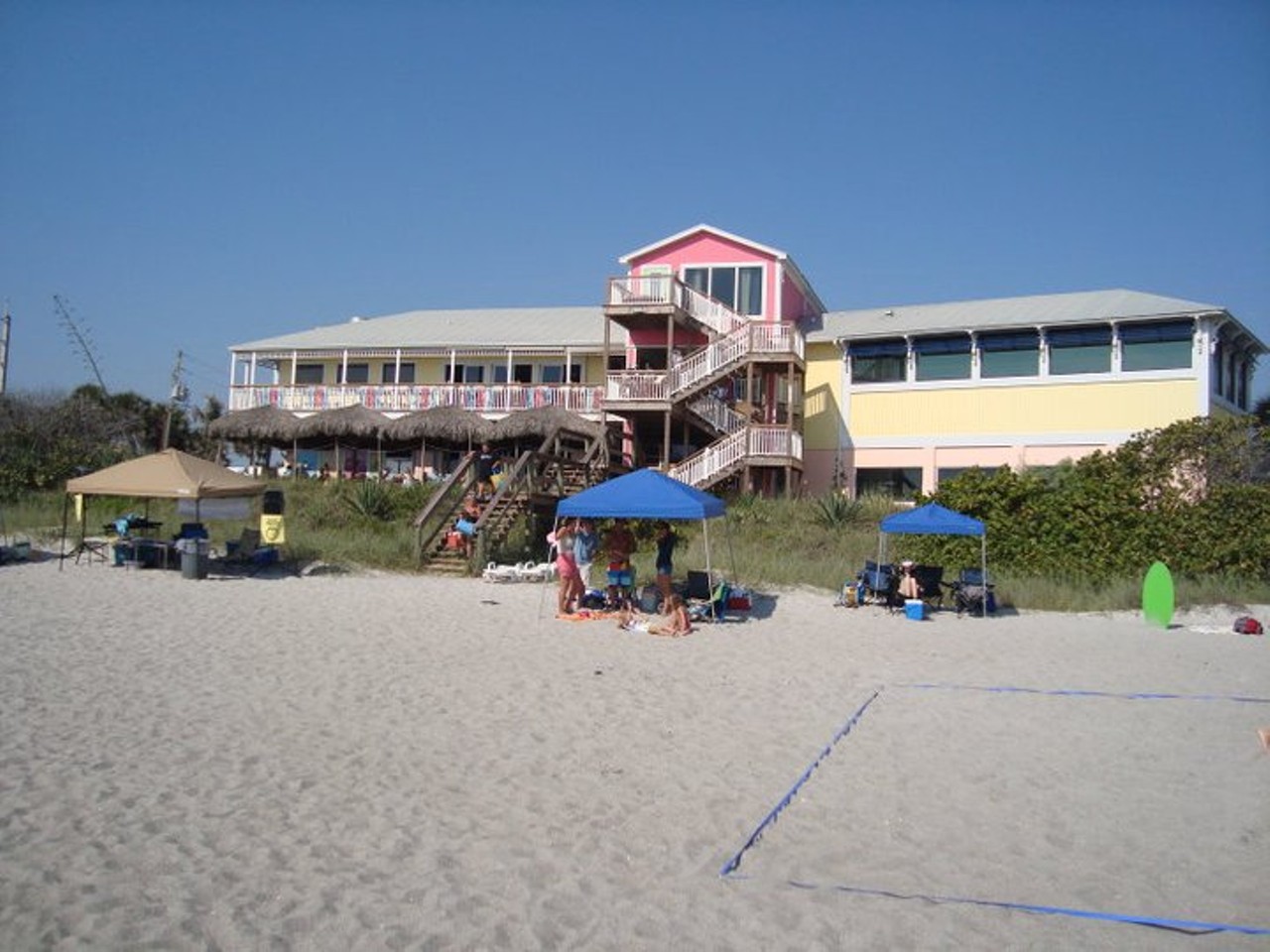 Sand on the Beach Bar and Grill
1005 Atlantic St., Melbourne Beach, 321-327-8951 
Sand on the Beach is a place to grab drinks and a bite to eat. After a quick swim or tan, one can choose from a variety of seafood, along with chicken, pork, and brisket options. Happy hour runs everyday from 11 a.m. to 7 p.m., and the fun continues with a monthly Full Moon Party with live music and drink specials. 
Photo via Sand on the Beach/Facebook