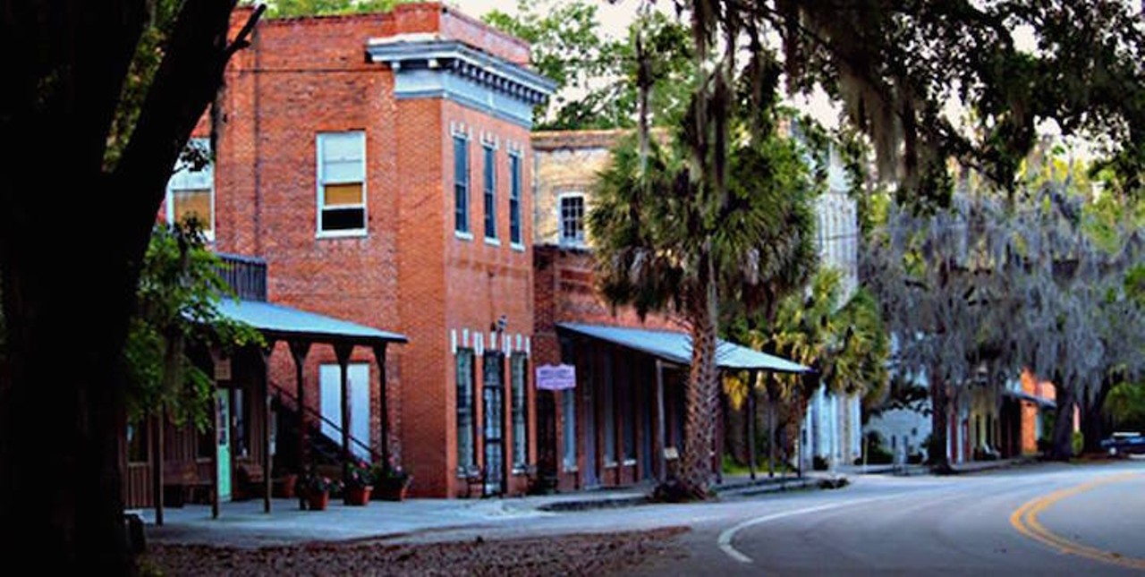 Micanopy
What&#146;s so great about it: 
This stunning old, southern town is full of charm from its people to the ancient buildings. Surrounded with oaks and spanish moss roads all over the town, walking there will make you feel as if you&#146;re in the gorgeous scenes of an old timey southern film. Micanopy held parts of the Seminole war as both a place for refuge and then conquest. To learn more about the town&#146;s history, make a stop at the Micanopy Native American Heritage Preserve. 
Where to eat and drink:  Old Florida cafe has delicious soups, rice and bean dishes, as well as cuban sandwiches sure to fuel you up for all the walking you&#146;ll be doing around town.
Photo via Chamber of Commerce/Facebook