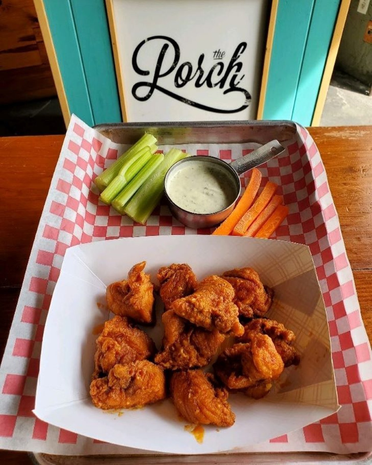 The Porch 
643 N. Orange Ave., Winter Park, 407-571-9101
You cannot go wrong with the Porch&#146;s twice cooked and brined crispy wings. Choose your own flavor of heartburn with 15 sauce options. 
Photo via The Porch on Facebook