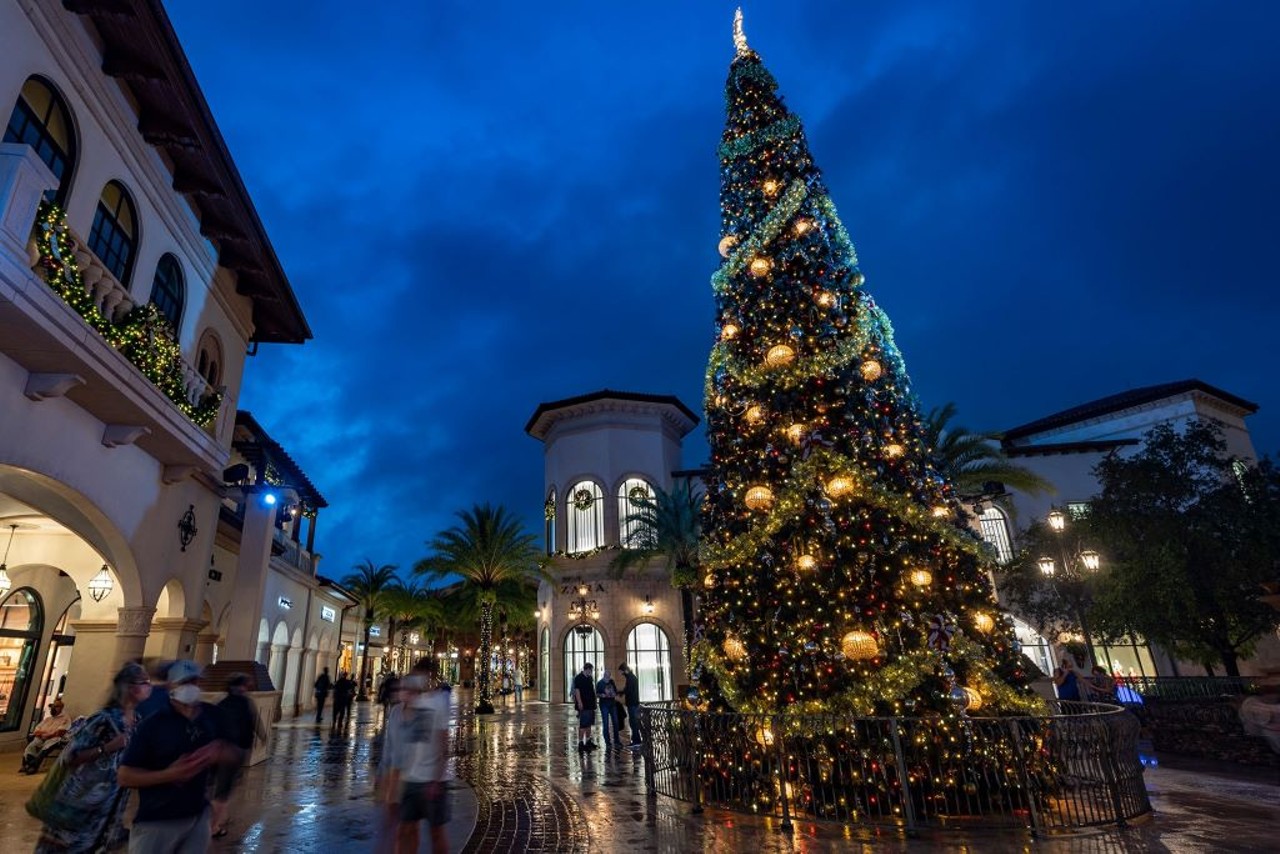 Disney Springs 
407-939-5277, 1486 Buena Vista Drive, Lake Buena Vista
Holiday shop, eat or enjoy live music while surrounded by glittering Christmas trees. There&#146;s 17 decked-out, Disney-themed Christmas trees scattered at the shopping mall. 
Photo via Disney Springs/Facebook