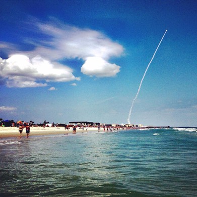Watch a rocket launch from the beach 
      
    
    Photo via Technology.org