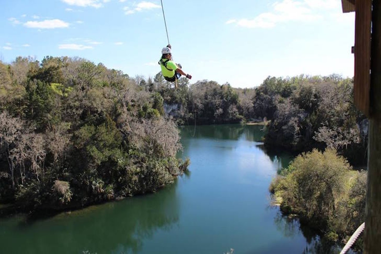 Canyons Zip Line and Canopy Tours
8045 NW Gainesville Road, Ocala | 352-351-9477
Witness lakes, cliffs, and massive canyons as you zip through the air on 9 different zip lines, while your guide gives you all sorts of tidbits about the area&#146;s nature, wildlife and history. The full tour is $96, with a shorter version (only 5 zip lines) available for $59.
Photo via The Canyons Zip Line and Canopy Tours/Facebook