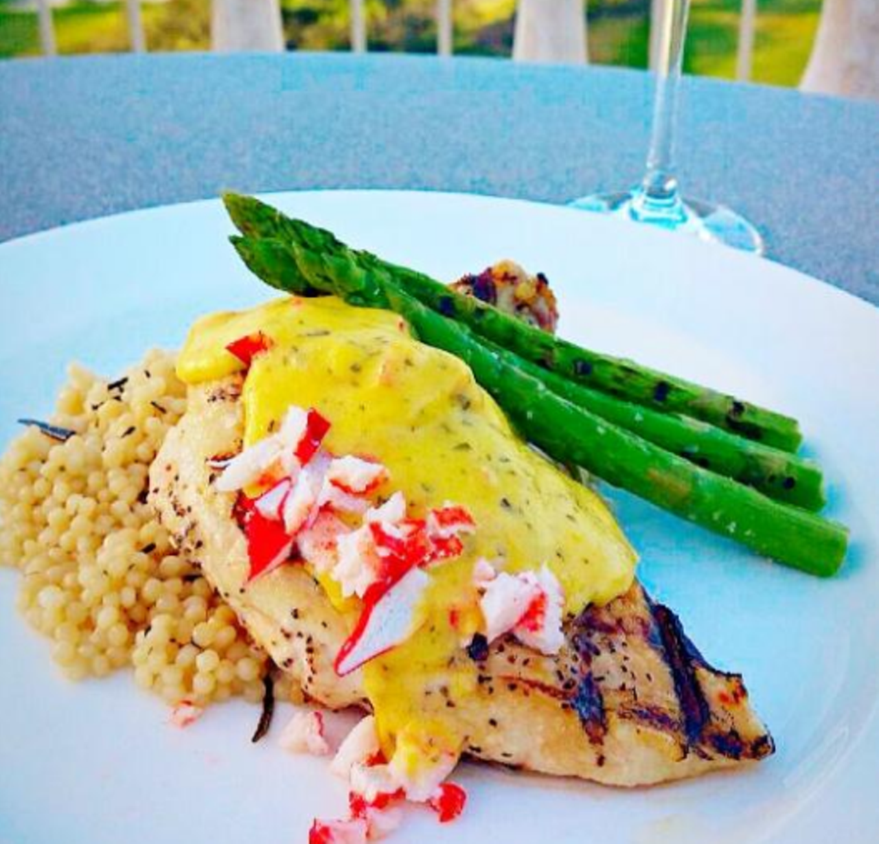  Chicken a la Oscar at Eleven at Reunion Resort
Another dual-meat, uber-classic preparation of &#147;airline chicken&#148; (just means that it&#146;s still on the bone = more flavor) plus jumbo lumb crab meat, couscous salad and bearnaise sauce.
7593 Gathering Drive, 407-396-5290
Photo via Eleven at Reunion Resort/Tripadvisor