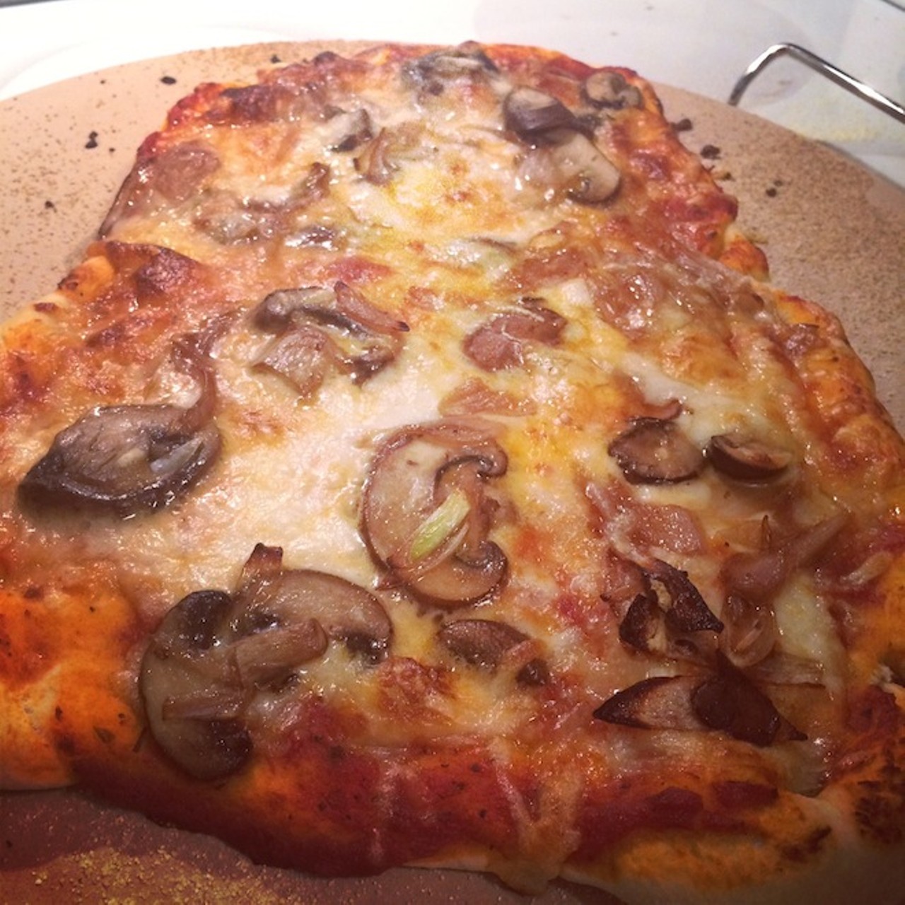 Homemade pizza with mushrooms and carmelized shallots