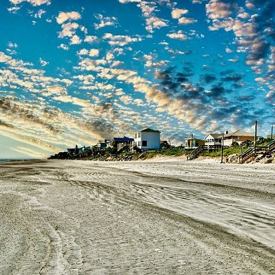 New Smyrna Beach     1 hour away    New Smyrna is known for its surfing and 17-mile white beaches, but if you happen to bring any four-legged friends, there&#146;s a dog beach not too far.         Photo via David S. Ferry |||/Flickr