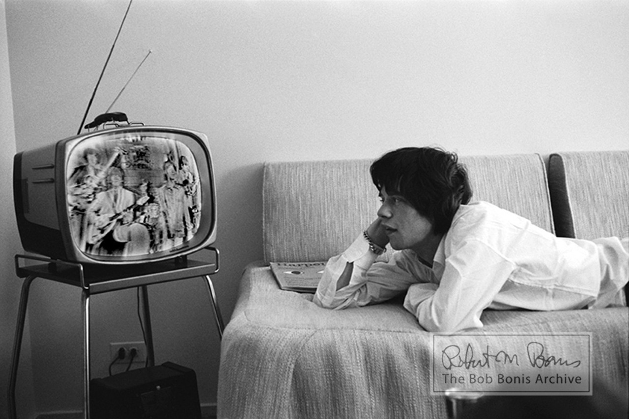 Mick Jagger Watching TV, Chicago, IL, October, 1964 #1 (It looks to us like he's watching a Rolling Stones performance. Check it out up close and personal at the museum and see what you think)