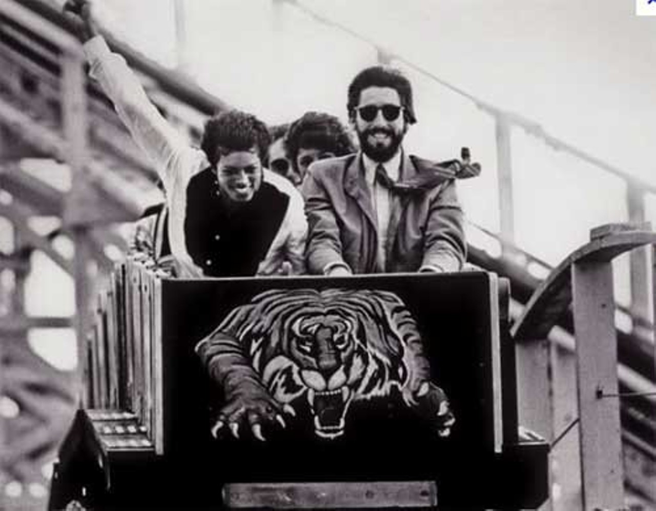 Every time he came to the area, he visited. Here he is riding the Roaring Tiger coaster with director John Landis. (via jimhillmedia.com)