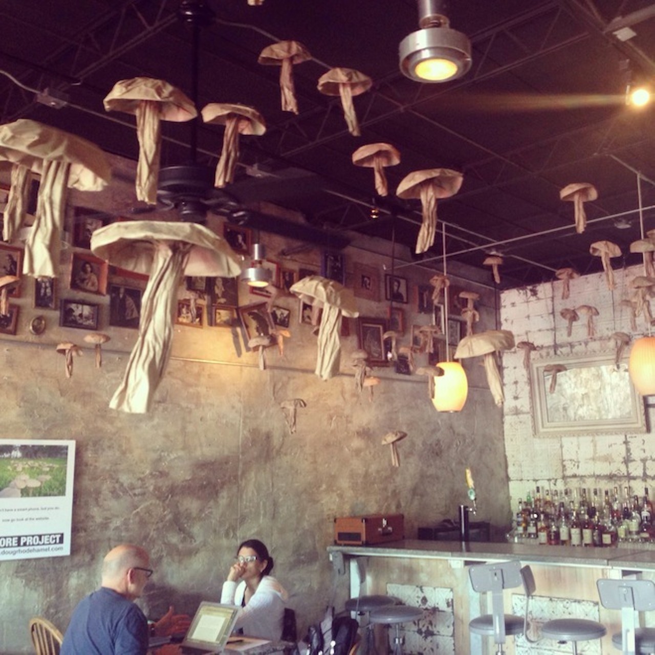 Paper-bag mushrooms hang at Stardust as part of Doug Rhodehamel's #sporeproject