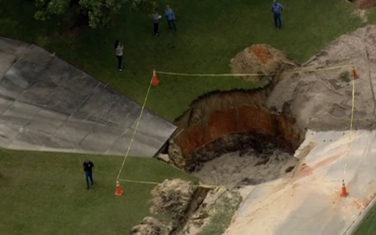 65-footer in Groveland, Fla.
August 24, 2015
Heavy rain, which is rather common in Florida, caused this Hell-mouth to show its ugly features in Groveland, Fla. This 65-footer had the potential for serious destruction, but only one person had to be evacuated from the area.
Photo via nbcmiami.com