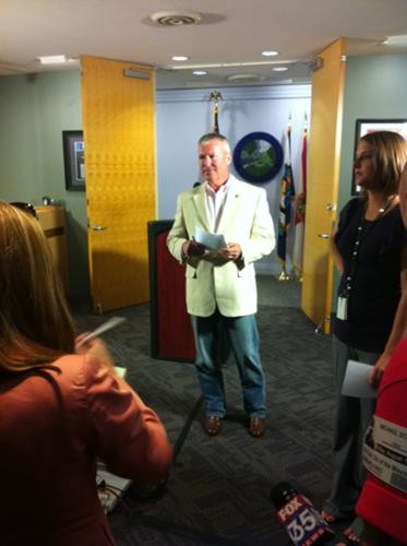 A slimmer and trimmer Mayor Dyer--35 pounds lighter, mind you--outside of his office on Aug. 19.