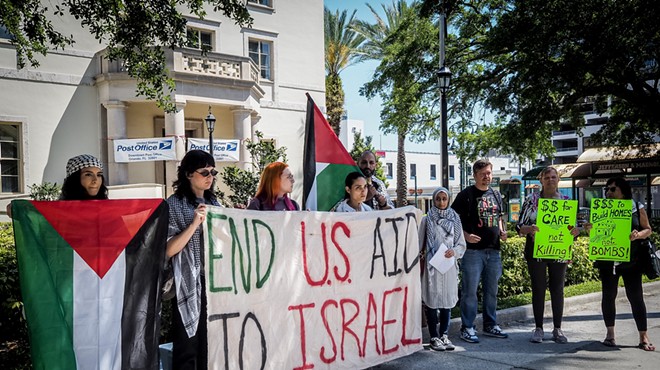 Locals gathered outside of the downtown Orlando USPS office on Tax Day, April 15, to uplift calls to action in support of Palestinians and against further U.S. military aid to Israel.