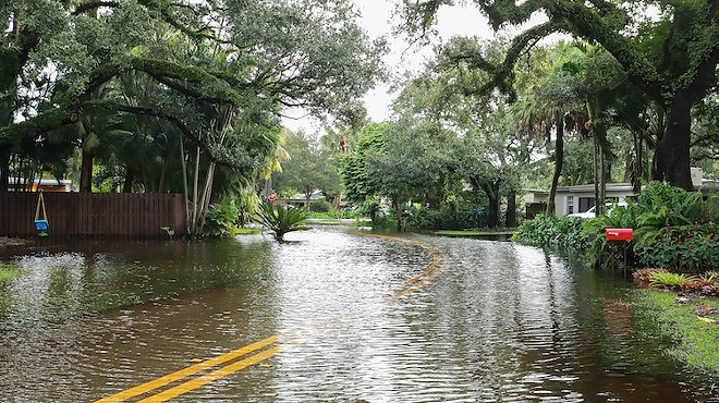 Flooded neighborhood street during Tropical Storm Eta, 2020