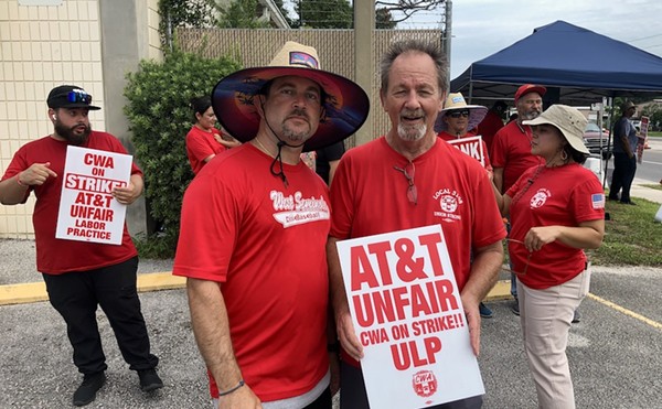 AT&T employees in Orlando continued picketing Friday, Sept. 13, over allegations of bad faith bargaining against AT&T.