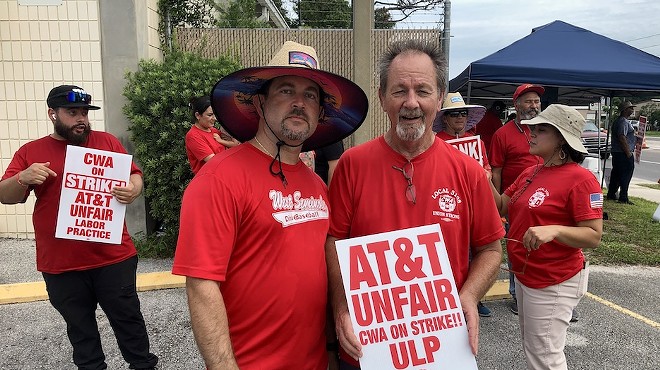 AT&T employees in Orlando continued picketing Friday, Sept. 13, over allegations of bad faith bargaining against AT&T.