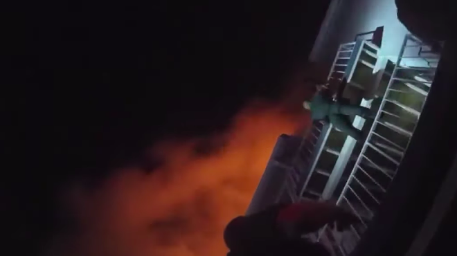 Bodycam footage shows Orange County deputy climbing balcony to save infant in Orlando apartment fire
