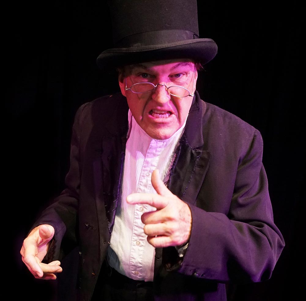 David McElroy as Ebenezer Scrooge