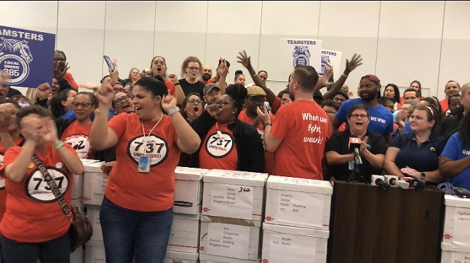 Disney World workers in Orlando celebrate a new contract with their fellow union members on March 29, 2023.