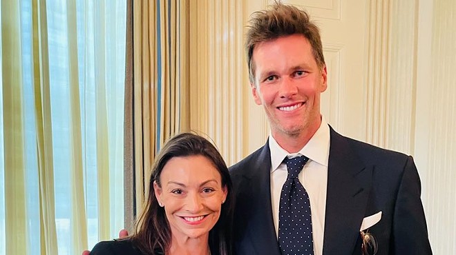 Florida's only statewide elected Democrat is facing criticism for posing with Tom Brady.