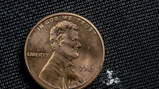 As little as two milligrams of faux fentanyl (pictured here next to a penny) can be a lethal dose