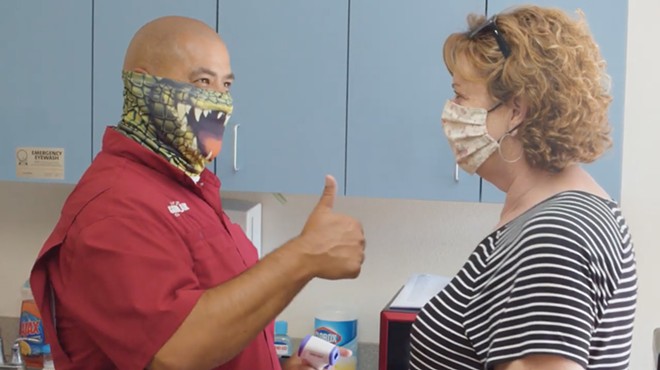 Gatorland's public safety preparedness video shows employee temperature checks