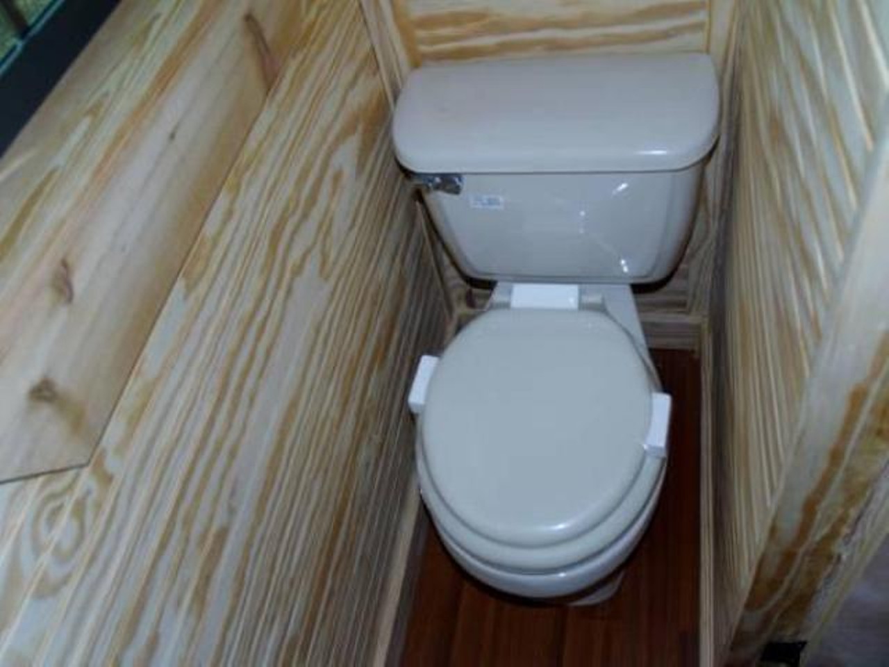 Tumbleweed Cypress 20
Price: $44000
Size: 144 sq ft 
It's probably so hard to clean behind that toilet.