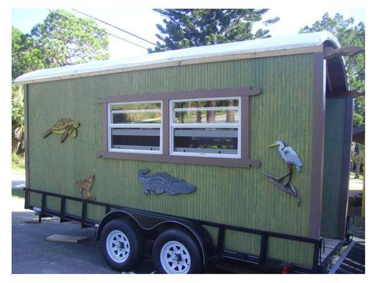 Ocean-themed Gypsy Wagon
Location: Englewood
Price: $8000
Size: 98 sq ft
If you buy this you can remove the animal stuff.