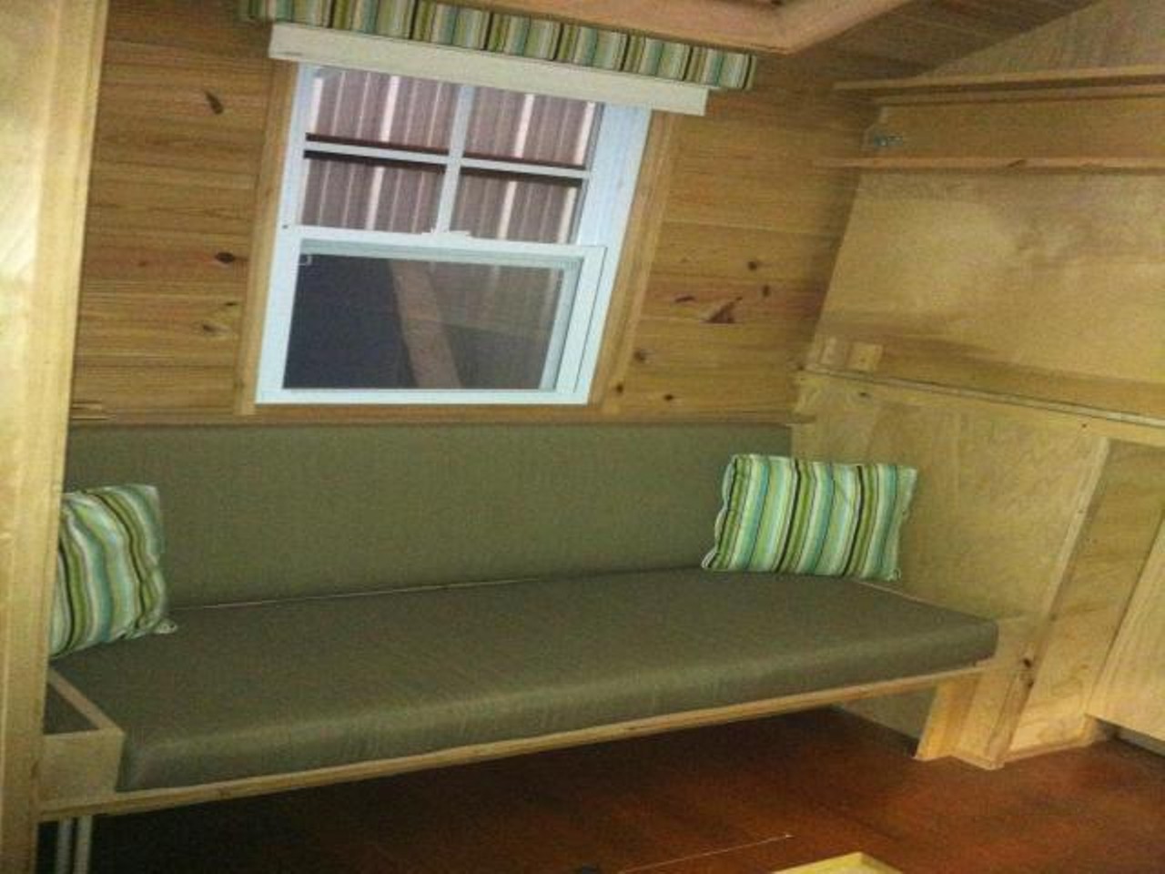Aqua Tiny House
Location: Eustis
Price: $15000
Size: 70 sq ft
The couch can double as a guest bed.