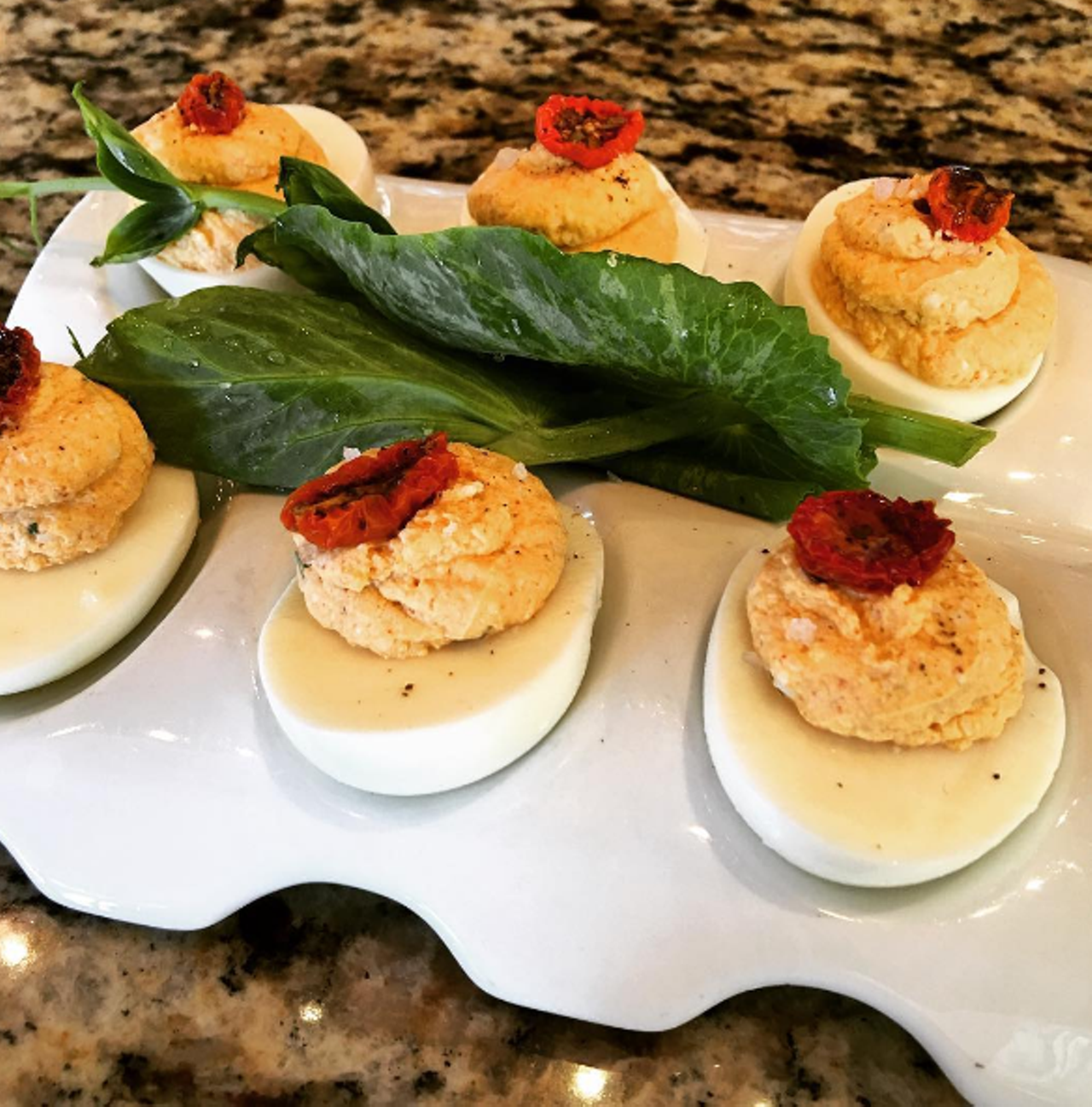 Lake Meadows &#147;Red Devil&#148; stuffed eggs from The Rusty Spoon
55 W. Church St., 407-401-8811
These protein bombs will sate hanger with Tabasco (hence the Red Devil part of the name), pickles, fresh herbs and oven-dried tomatoes mixed into the filling.
Photo via tomsartori/Instagram
