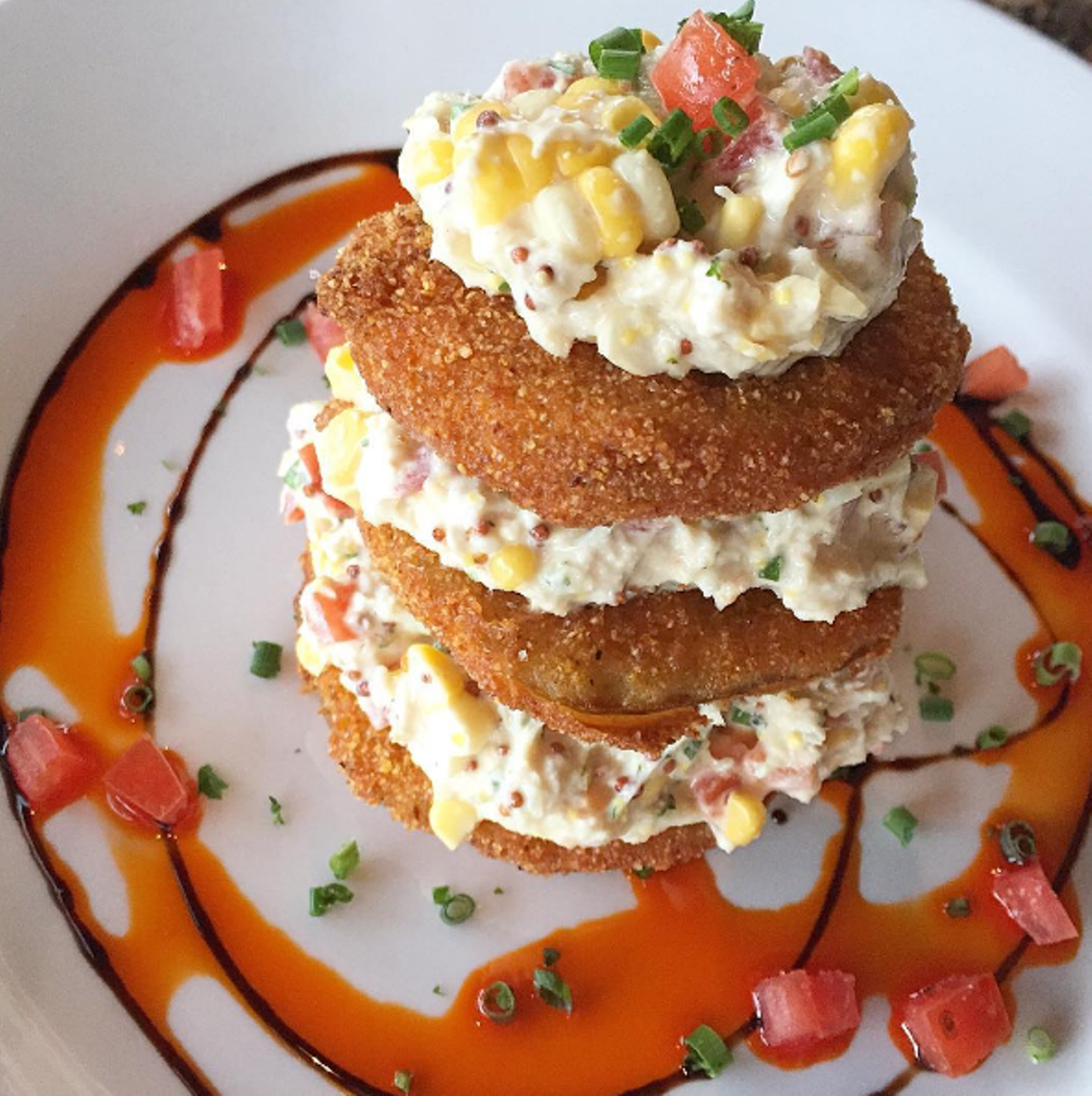Fried green tomato at K Restaurant
1710 Edgewater Drive, 407-872-2332
This southern staple is topped with sweet yellow corn and crab salad, with a whole-grain mustard dressing to tie the components together.
Photo via bitemeorlando/Instagram