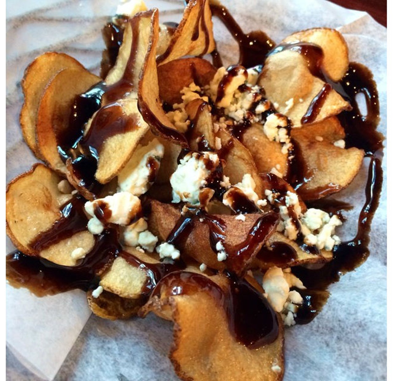 Black and bleu chips from Nona Tap Room: house-made potato chips with balsamic glaze and bleu cheese crumbles (via Instagram user @nique_eats)