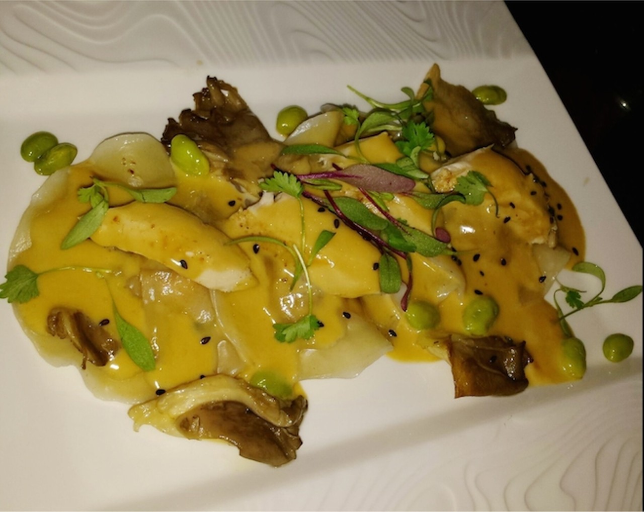 Soco-Style "Chicken and Dumplings"
(Carved Chicken Breast, Lobster Dumplings, Local Mushrooms, Edamame, Soy Butter)